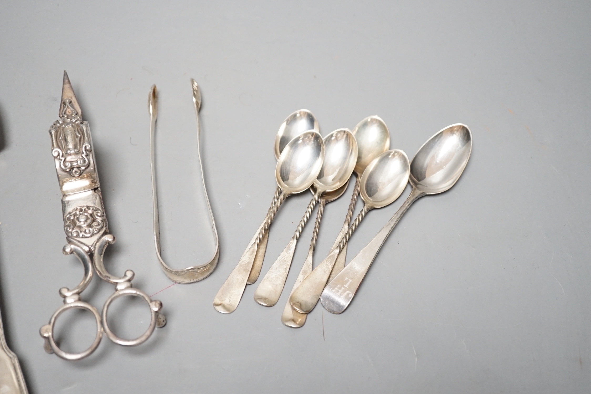 A Victorian silver fiddle and thread pattern stilton scoop, George Adams, London, 1852, 22.3cm, a small group of silver flatware and a plated toddy ladle and pair of candle snuffers.